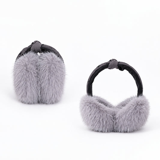 Grey bow print earmuffs shown folded and open