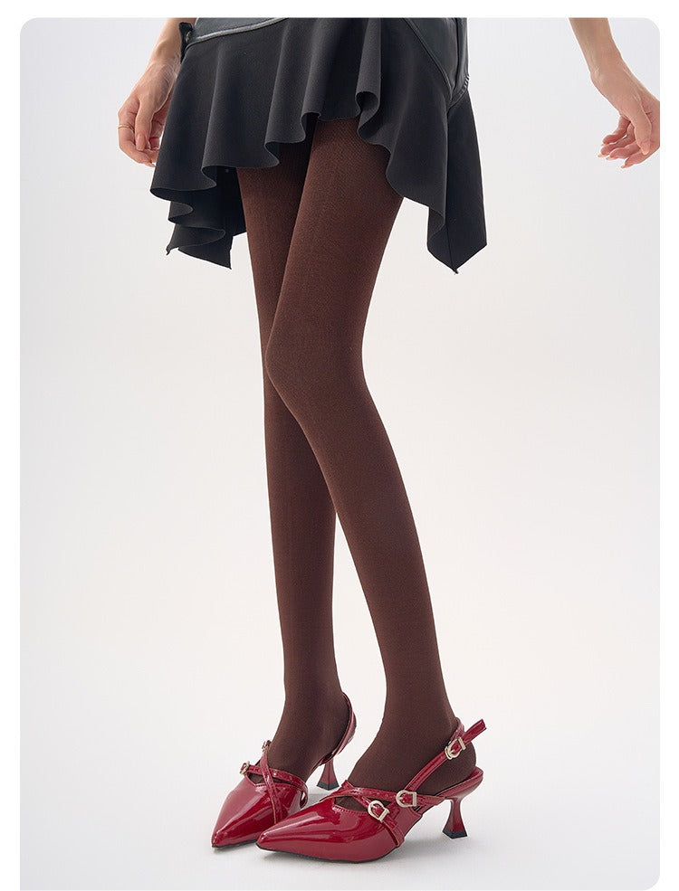 Winter thermal wool-blend tights in burgundy, worn with red pointed heels