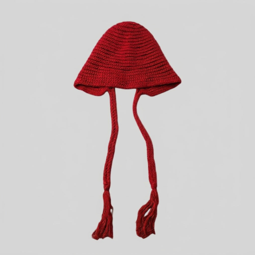 Red bell-shaped knitted hat with long tasselled ties