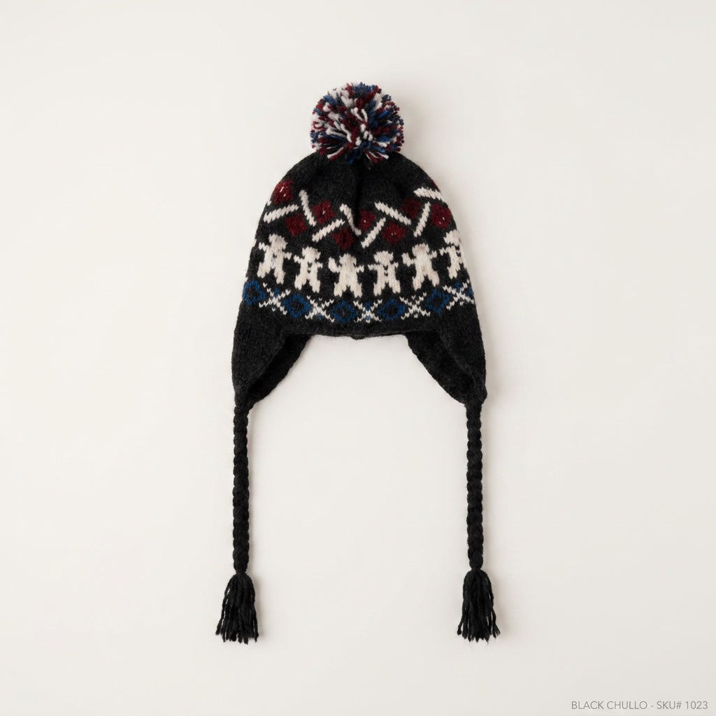 Navy gingerbread man ear-flap hat with burgundy zigzag band, laid flat