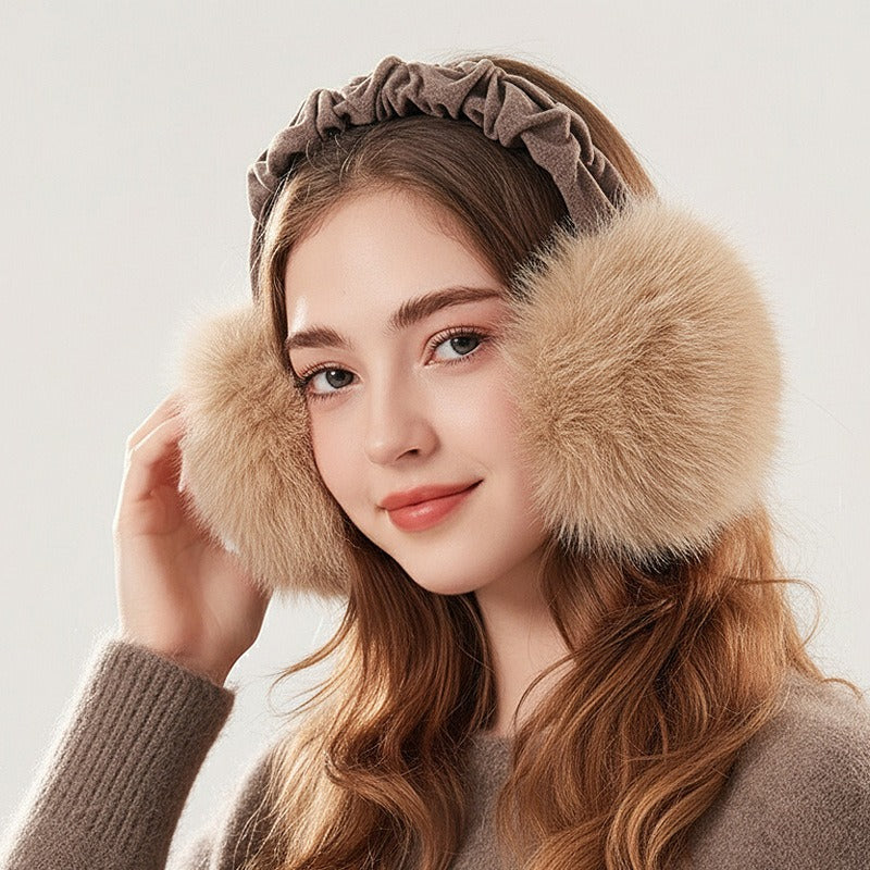 Woman wearing the khaki earmuffs with a ruched headband and fluffy muffs