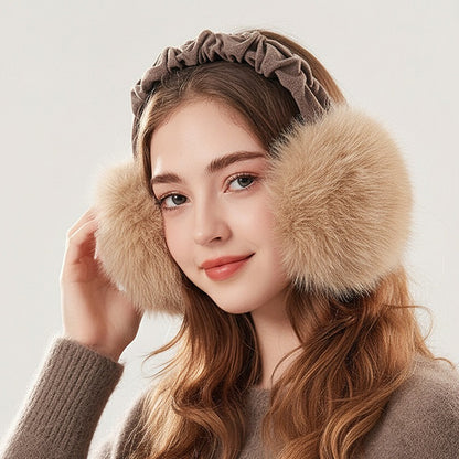 Woman wearing the khaki earmuffs with a ruched headband and fluffy muffs