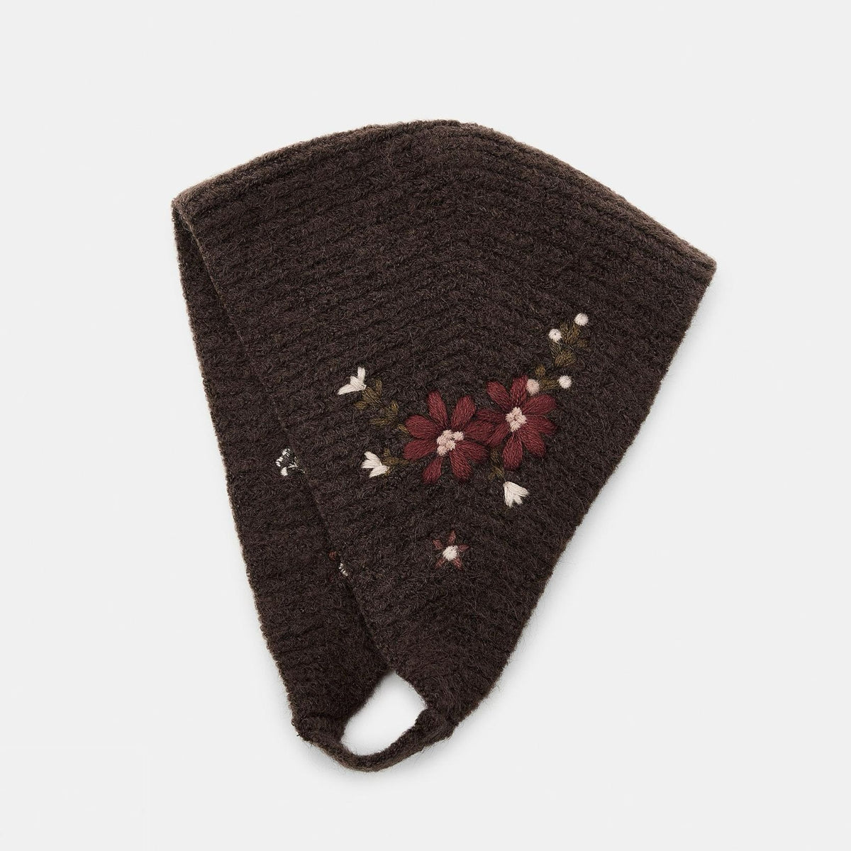Coffee brown knitted headscarf with embroidered flowers and chin strap, laid flat
