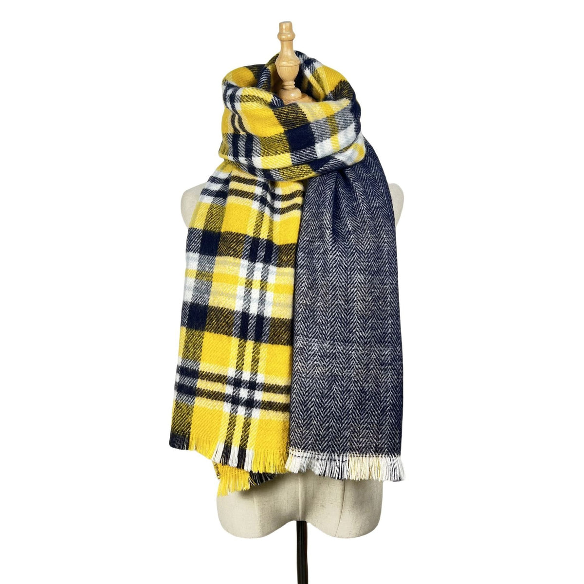 Yellow plaid scarf with navy reverse wrapped on a mannequin