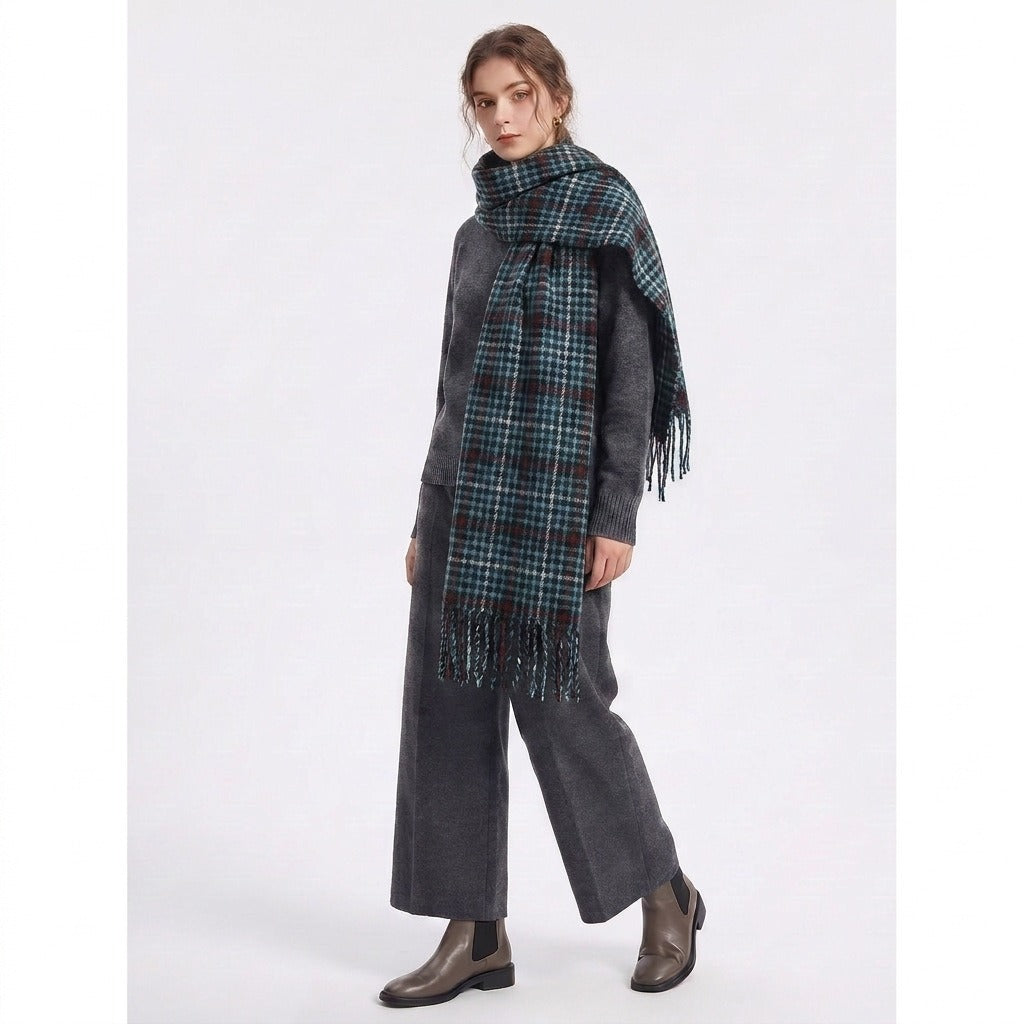 Woman wearing the green houndstooth scarf wrapped around the neck