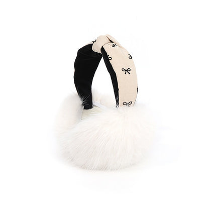 Beige earmuffs with fluffy white muffs and a bow print headband