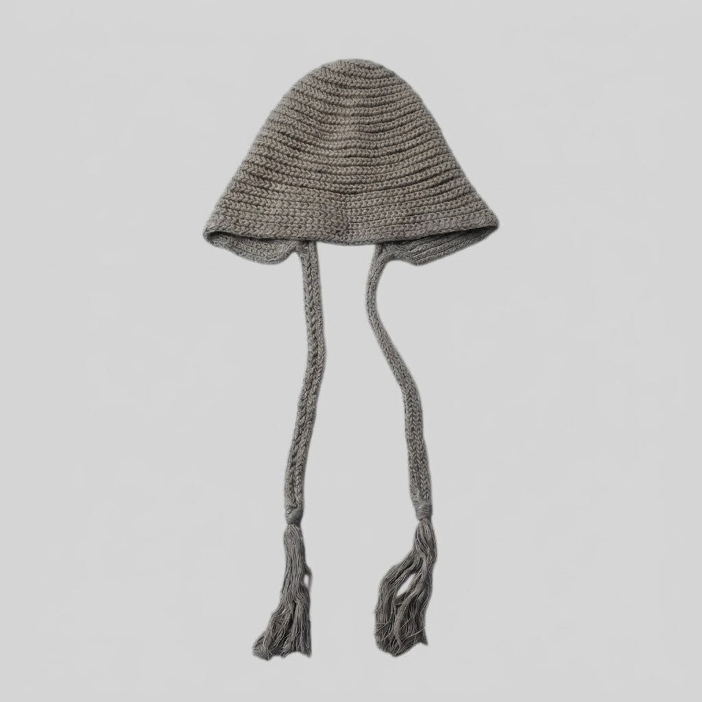 Grey bell-shaped knitted hat with long tasselled ties