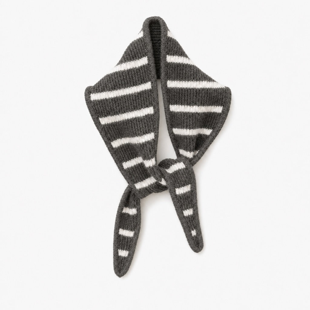 Charcoal grey triangle scarf with cream stripes, knotted, on a white background