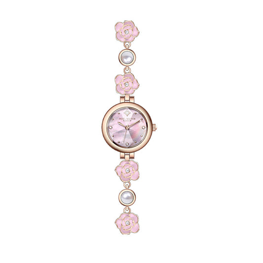 Rose gold camellia bracelet watch with a pink dial and pearly beads