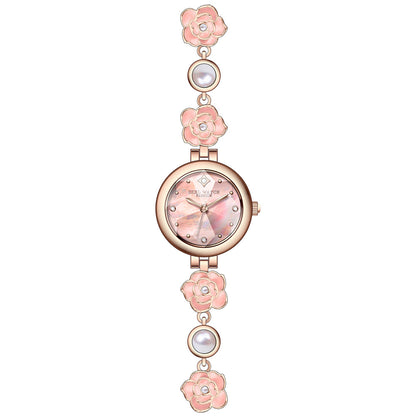 Rose gold camellia bracelet watch with pink flowers and a pink dial