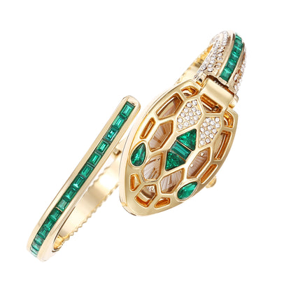 Gold snake-head bangle watch set with green crystals