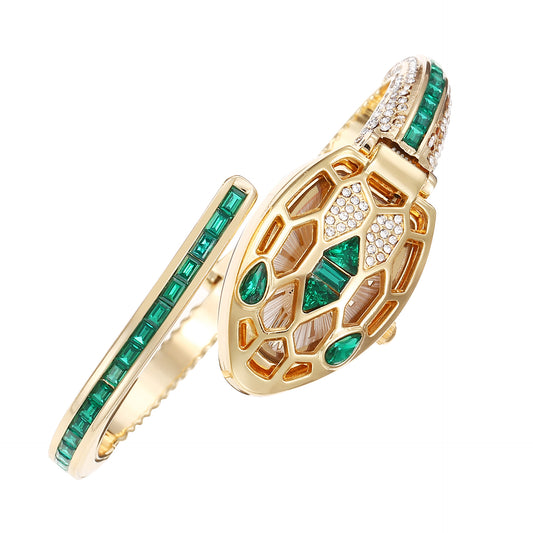 Gold snake-head bangle watch set with green crystals