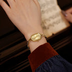 Dainty Oval Gold Watch