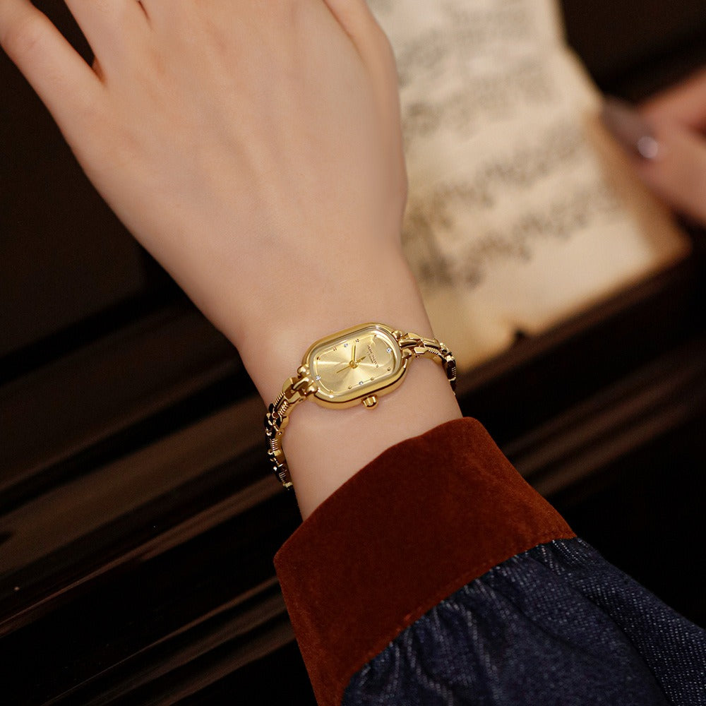Dainty Oval Gold Watch