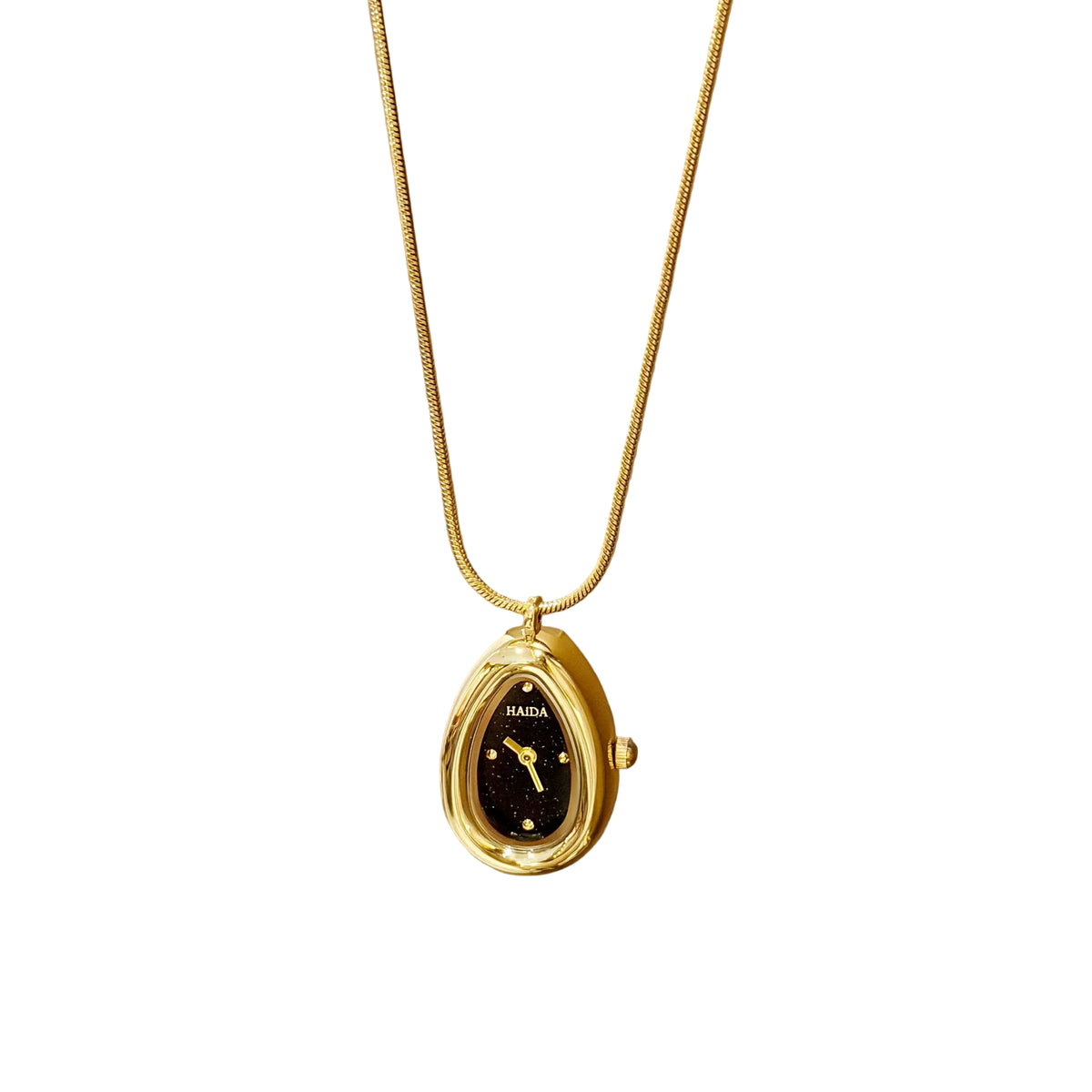 Gold teardrop pendant watch with a black dial on a snake chain