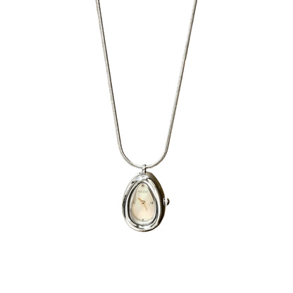 Silver teardrop pendant watch with a white dial on a snake chain