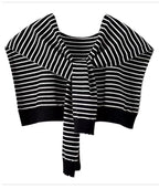 Black and white striped sweater on a white background