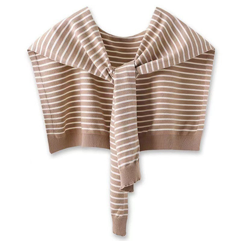 Striped sweater with a bow neckline on a white background