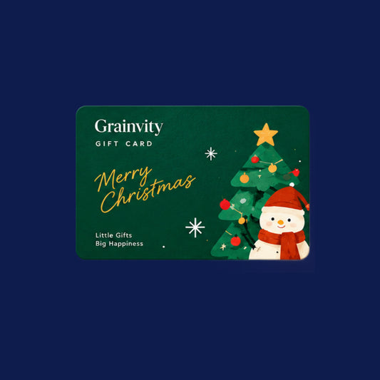 Green Grainvity Christmas gift card with gold "Merry Christmas" script, a decorated tree and a snowman in a red hat, on a navy background