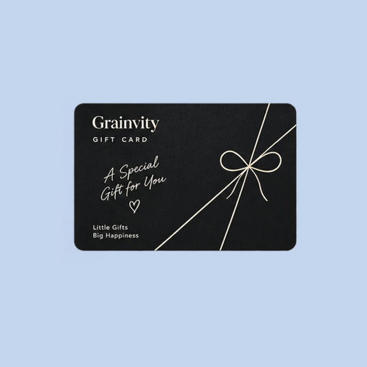 Grainvity "A Special Gift for You" black e-gift card design with a thin white bow, shown on a light blue background