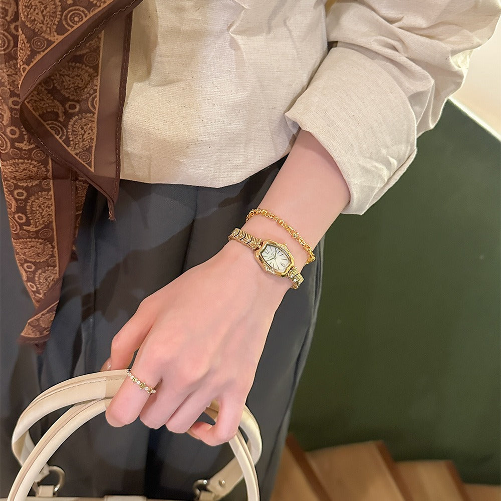 Elegant Gold-Tone Quartz Watch with Mother of Pearl Dial