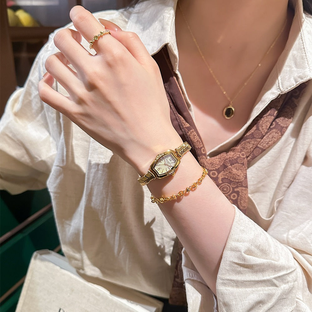 Elegant Gold-Tone Quartz Watch with Mother of Pearl Dial