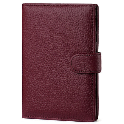 Burgundy leather passport holder.