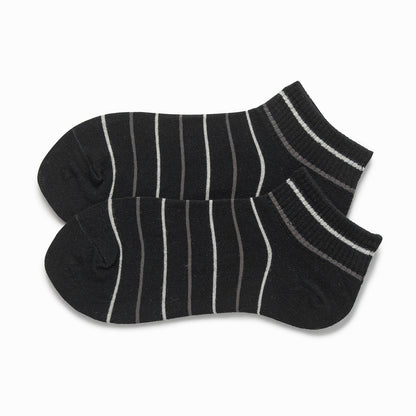 Black ankle socks with a white and grey striped ribbed cuff, side view