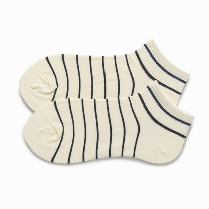 Cream ankle socks with black pinstripes and a navy and black striped rib cuff