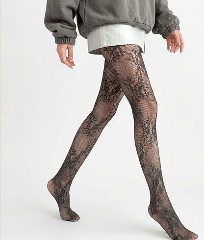 Vintage rose lace ultra-sheer tights in black, side view showing the floral lace pattern